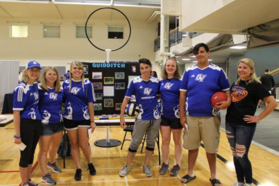 Quidditch athletes pose at event